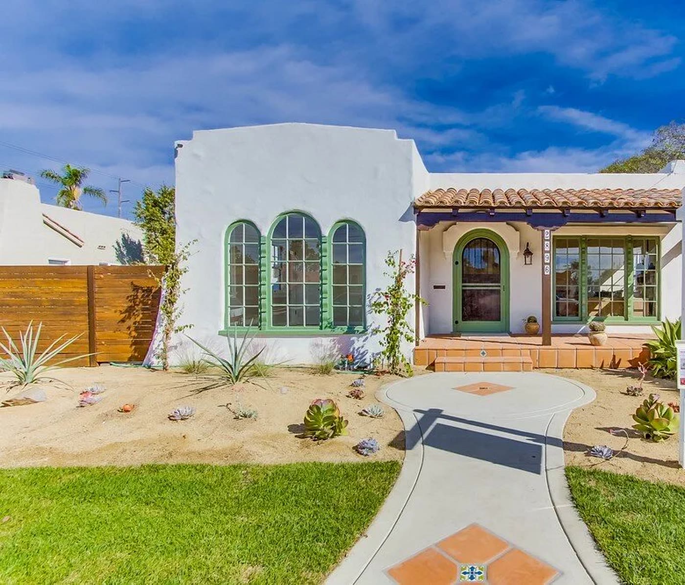 Restored Spanish revival home with new concrete walkway, San Diego