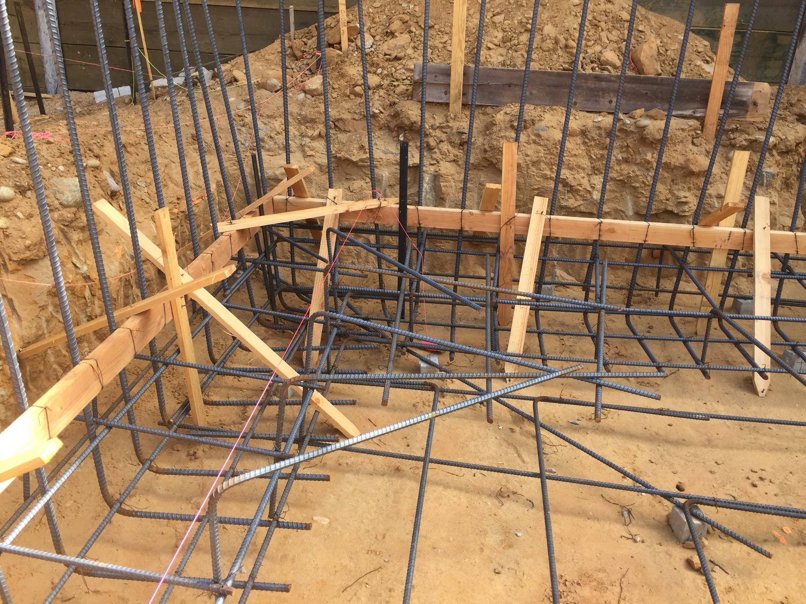Footing reinforcing cages formed at the basement perimeter