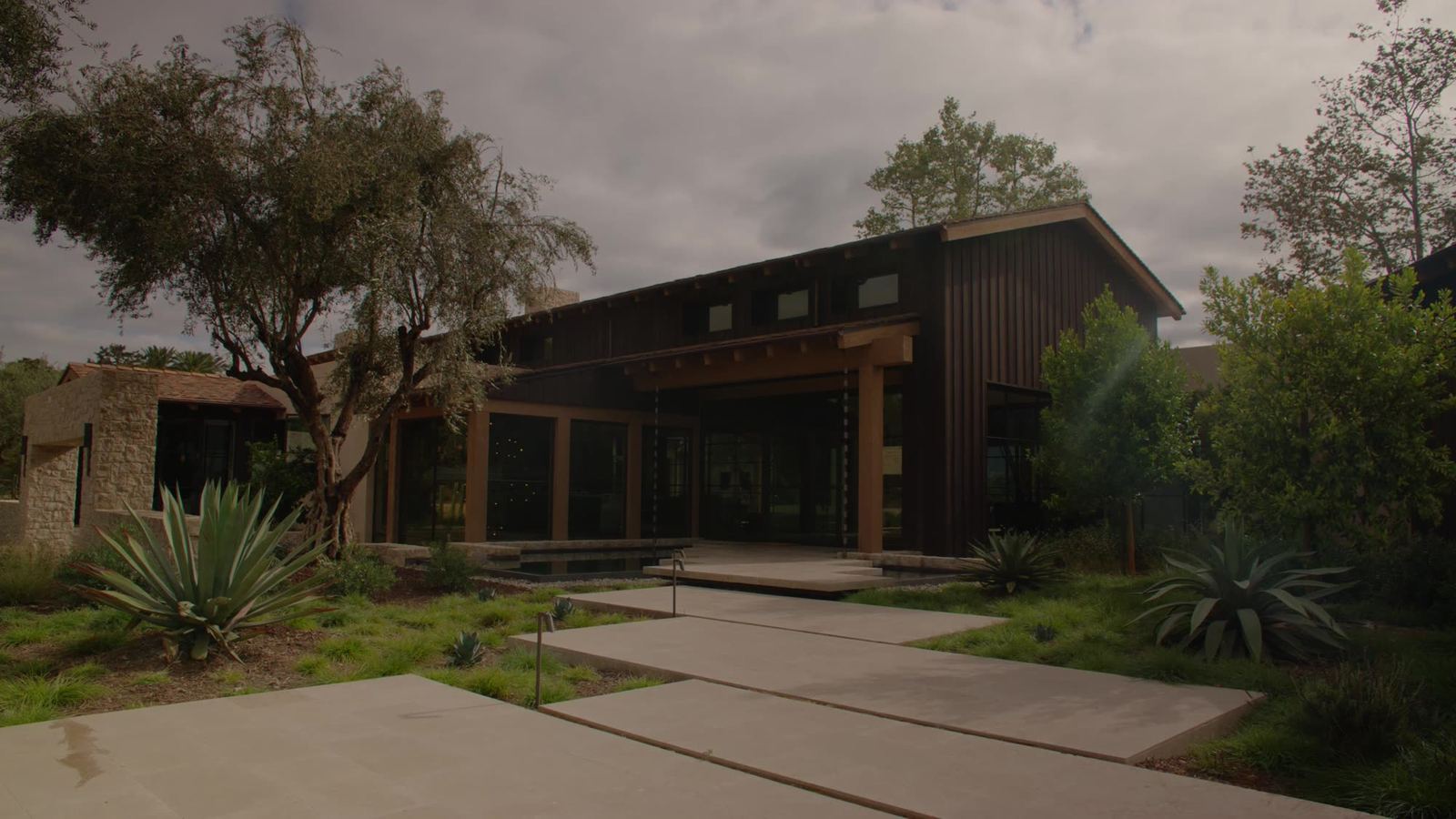 Main residence at North Montevideo — 4x8 framing, siding and concrete walkways