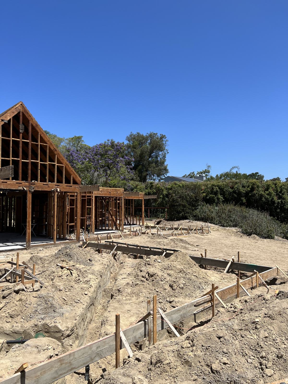 Framing and foundation work underway on the rebuilt residence
