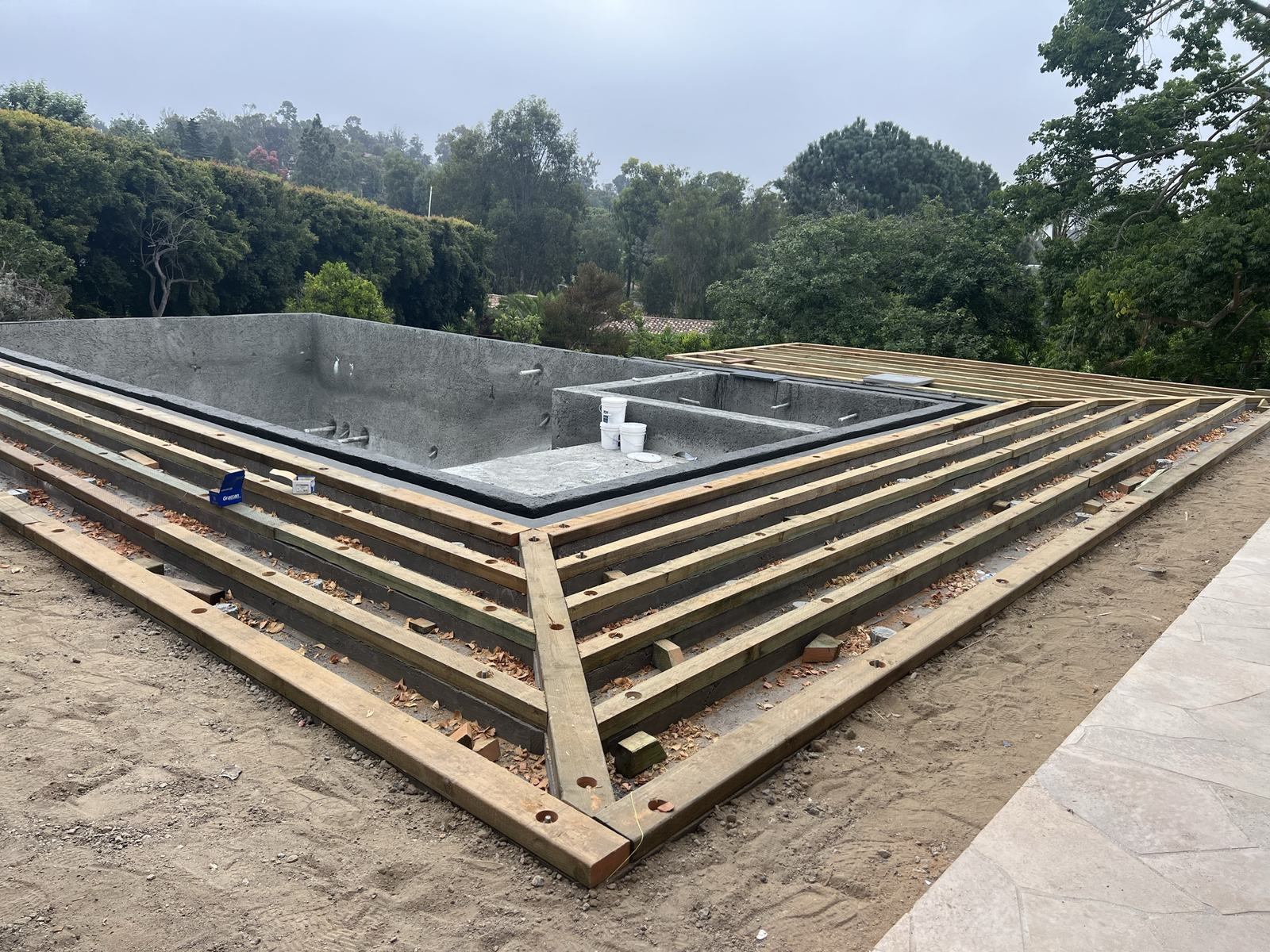Deck structure complete around the pool at Paso Del Sol
