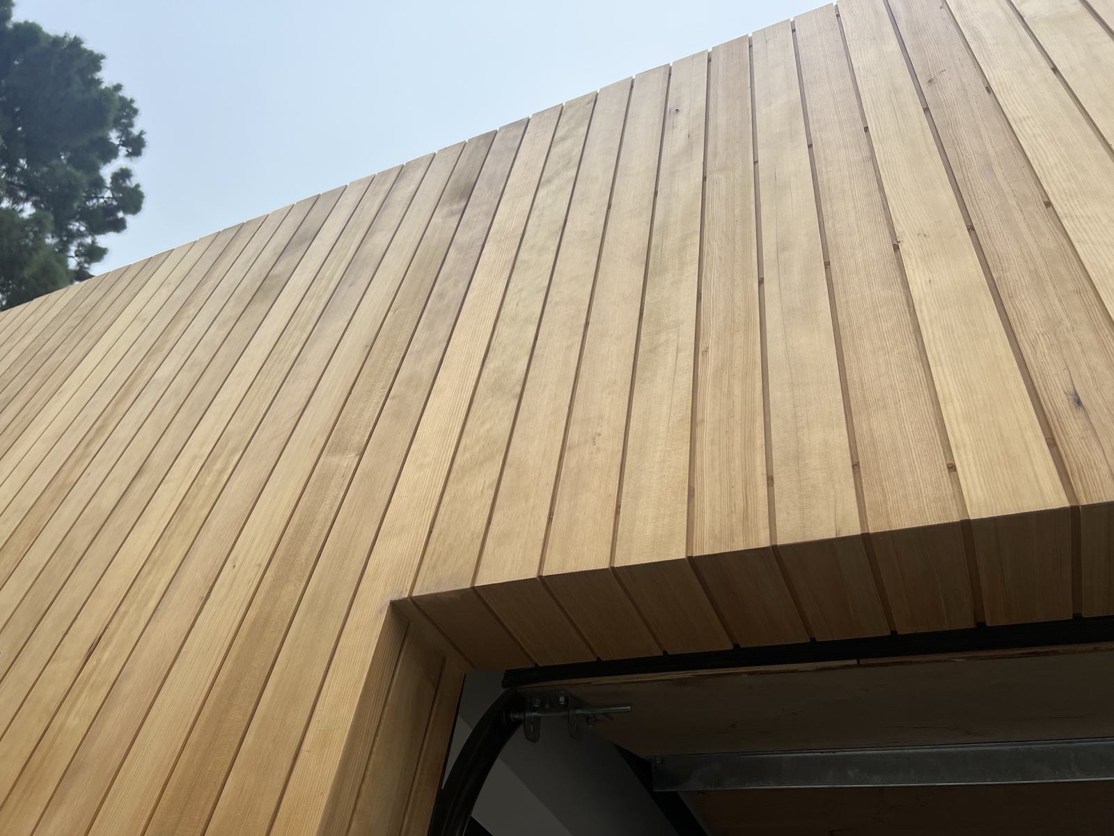 Teak decking and soffit detail at the deck edge