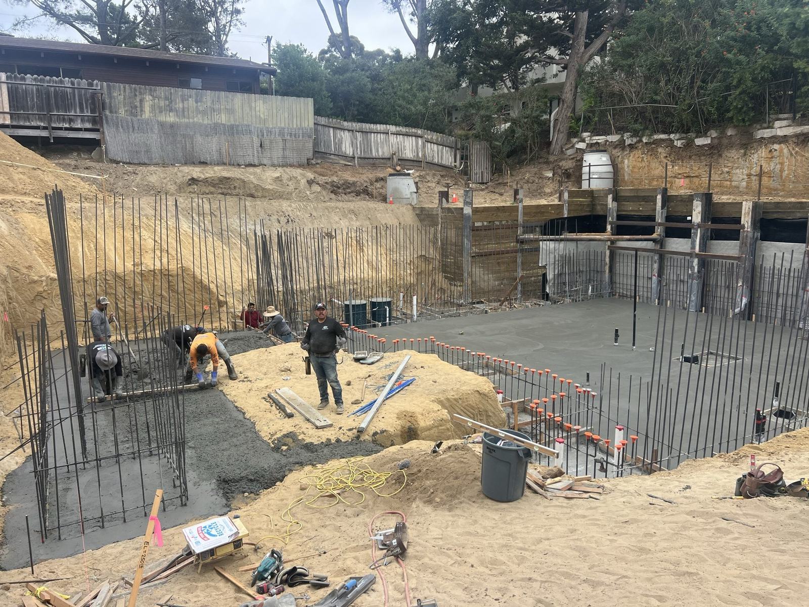 4x8 crew placing concrete for the basement foundation