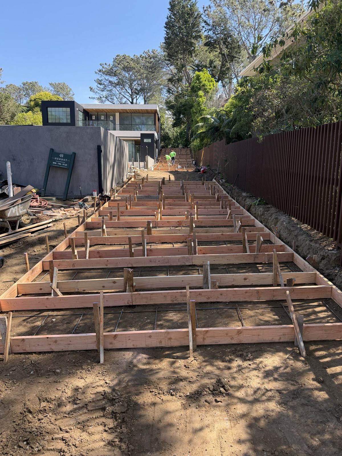 Formed hardscape steps stepping up the Del Mar hillside