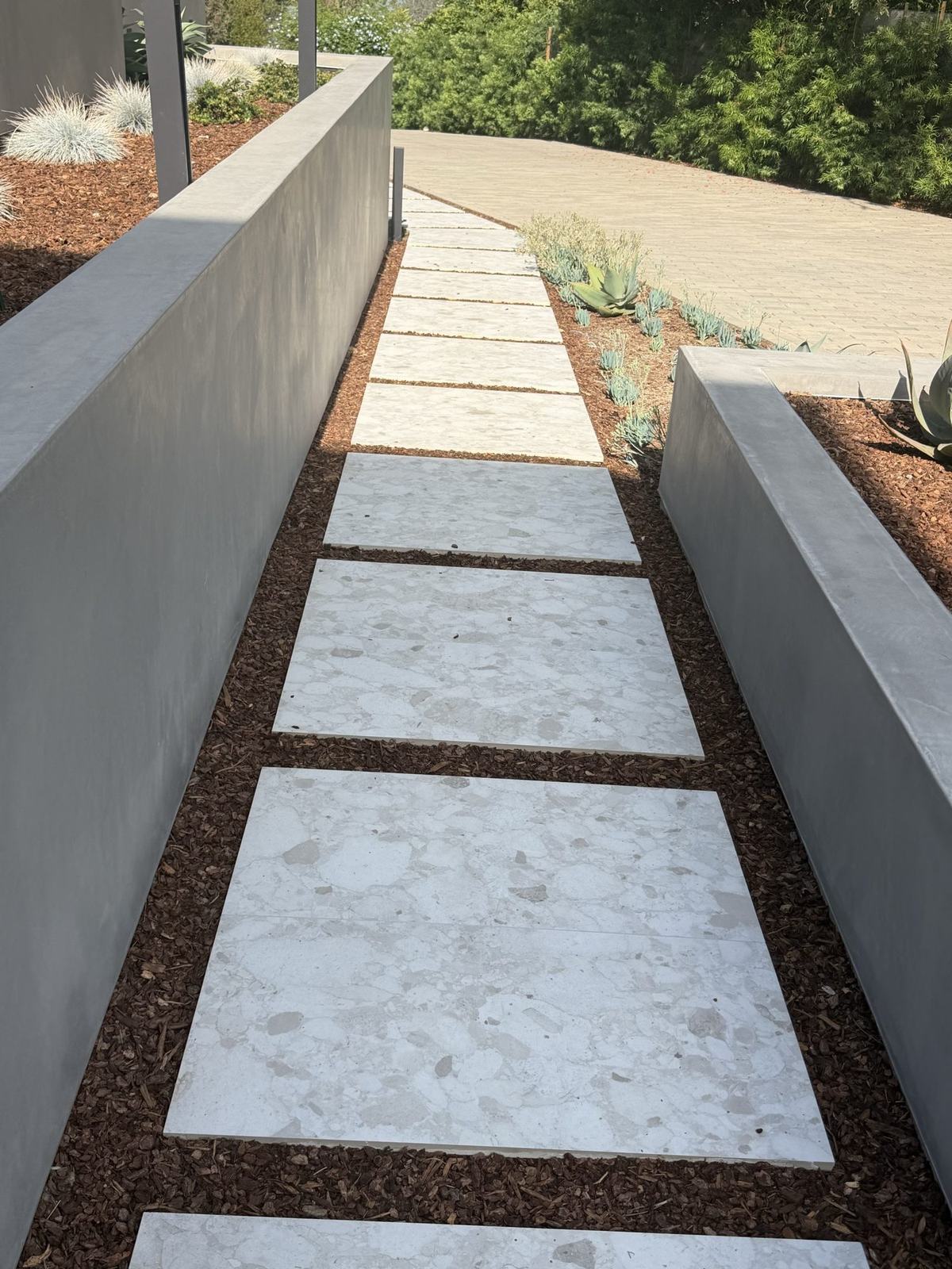 Stone-clad terraced stairs stepping down the hillside